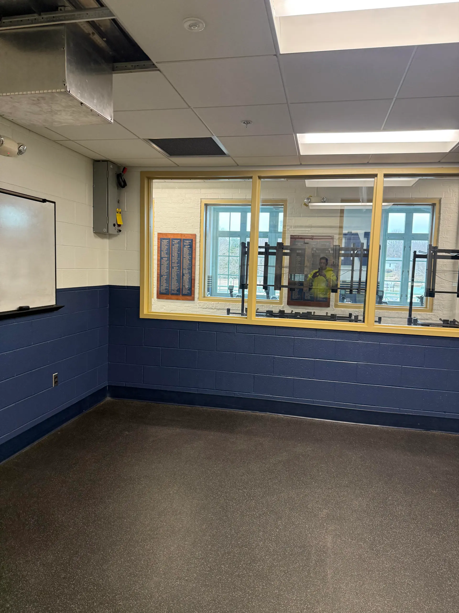 Two-tone interior painting in an athletic facility